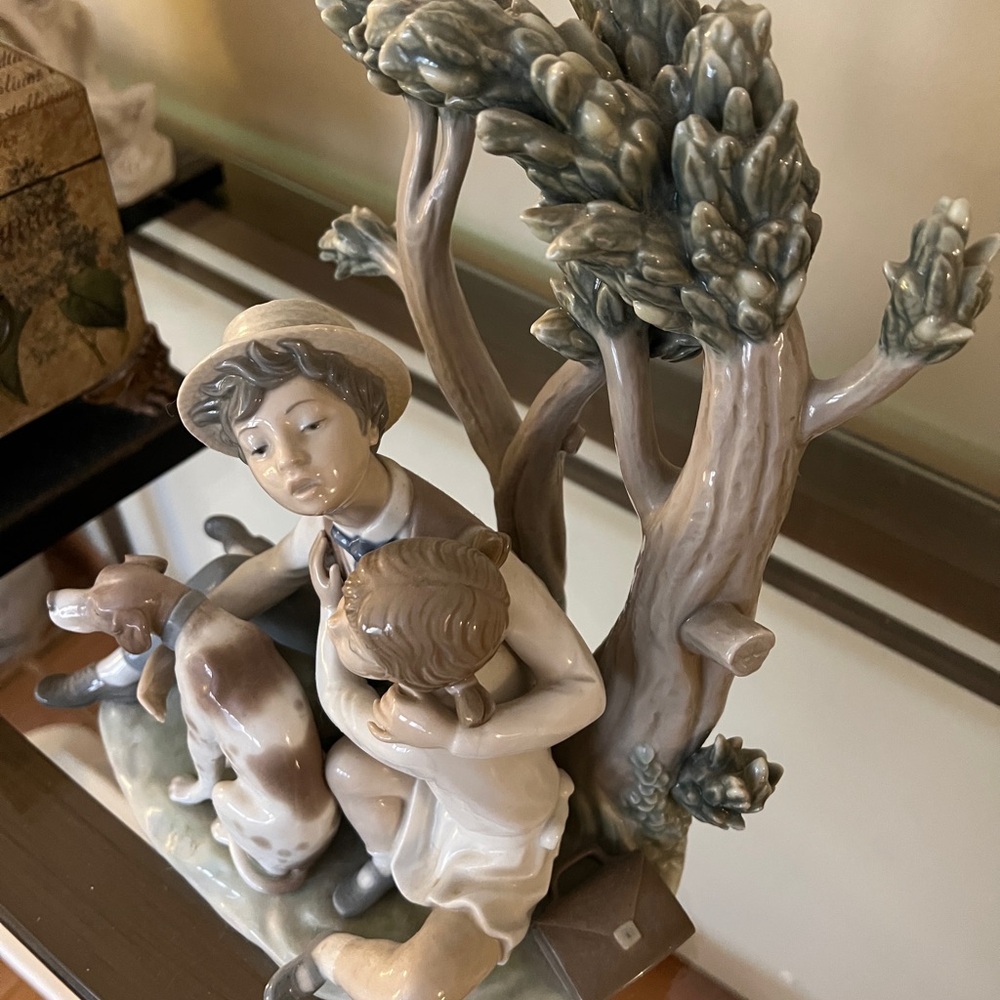 Lladro  Porcelain Figurine with Boy and Dog retired #4891. “Looking for refuge”
